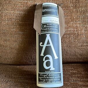 Never opened white vinyl lettering wall decor.
